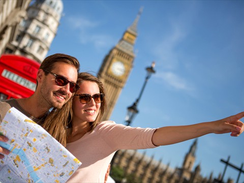 bigstock-Couple-of-tourists-in-London-h-37073230